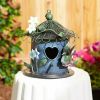 Whimsical Blue Metal Birdhouse